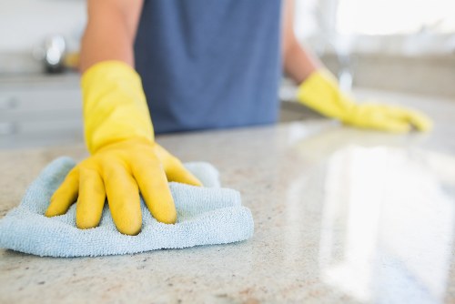Technician completing a carpet cleaning service with care